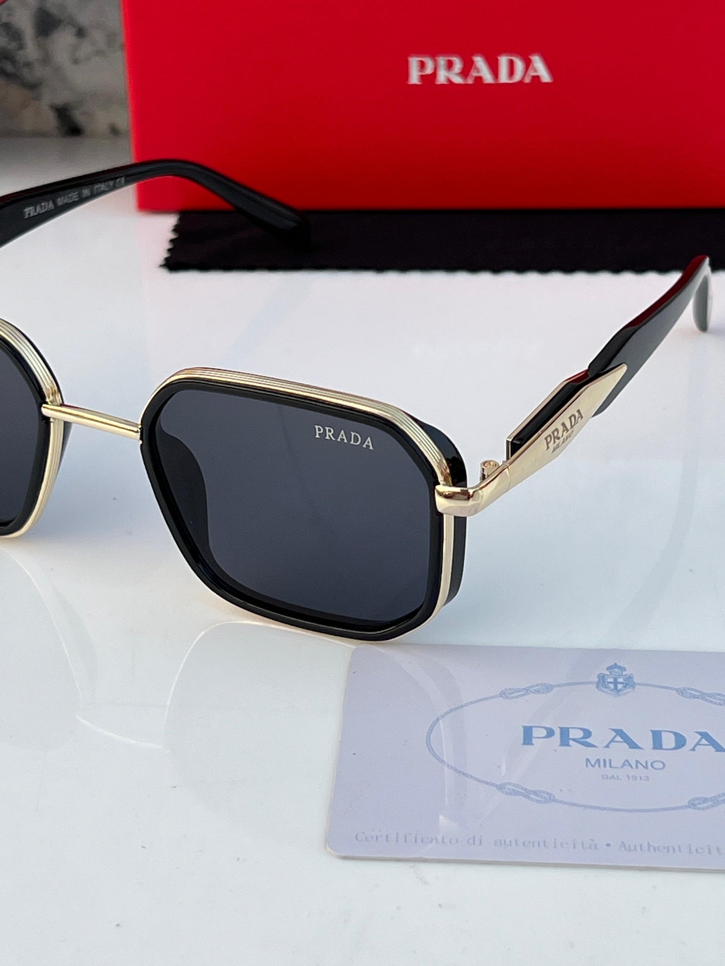 PRADA GOLDEN BLACK