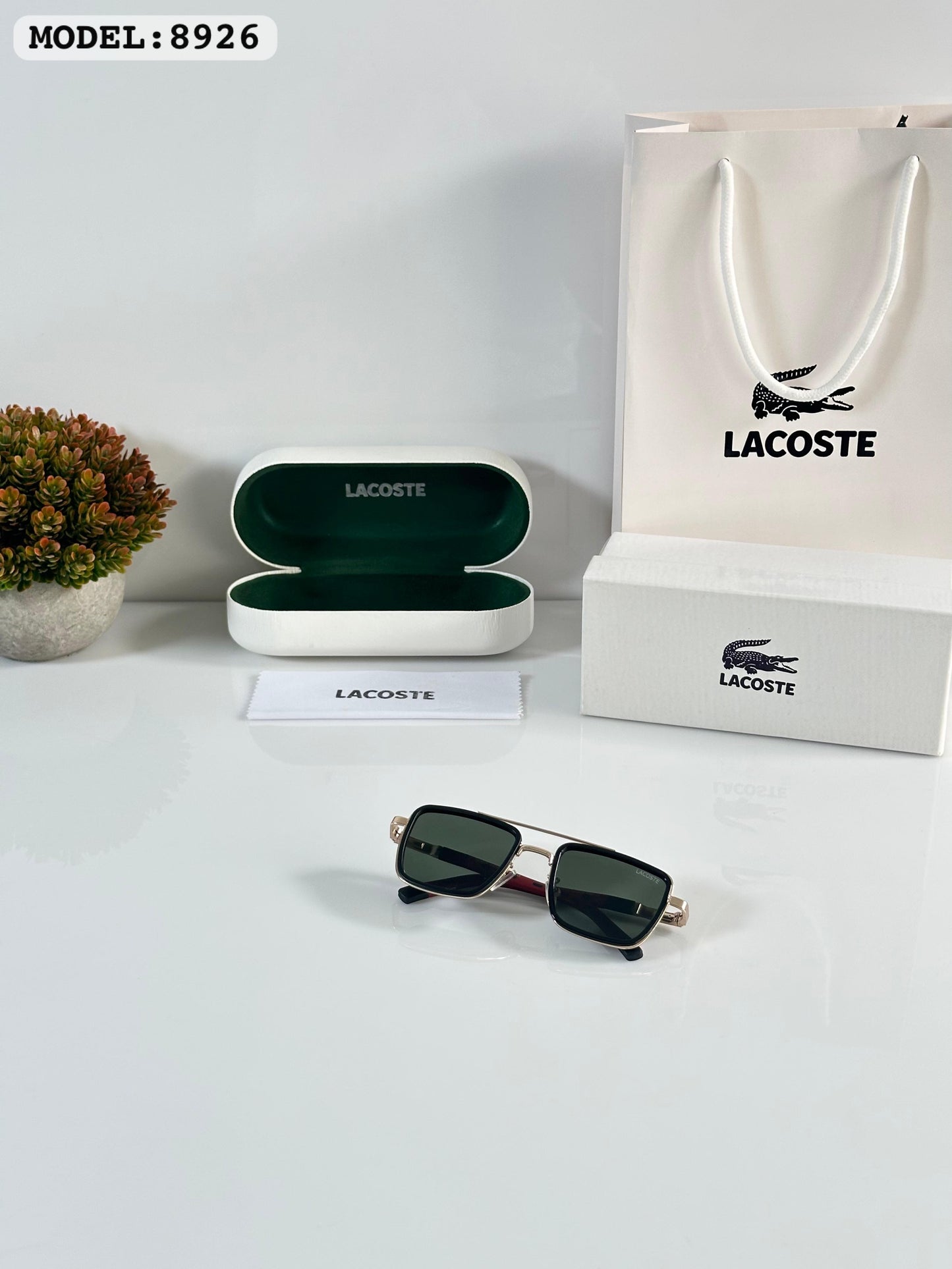 LACOSTE GOLD BLACK