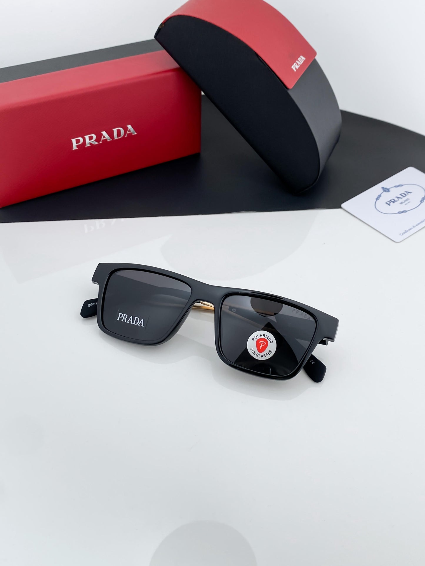 PRADA BLACK AND GOLD