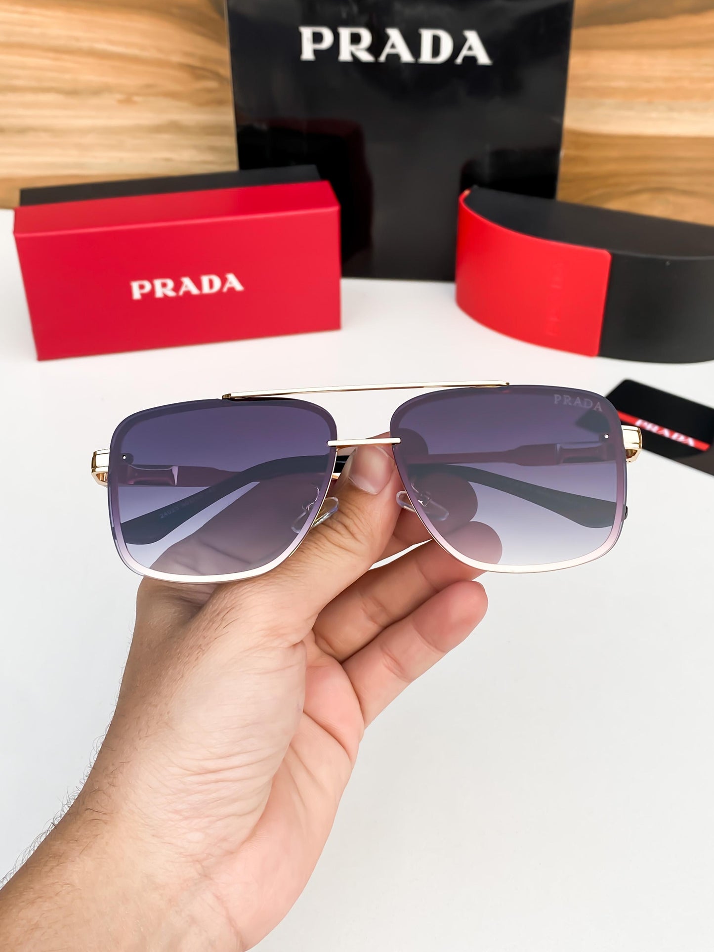 PRADA GOLD BLACK