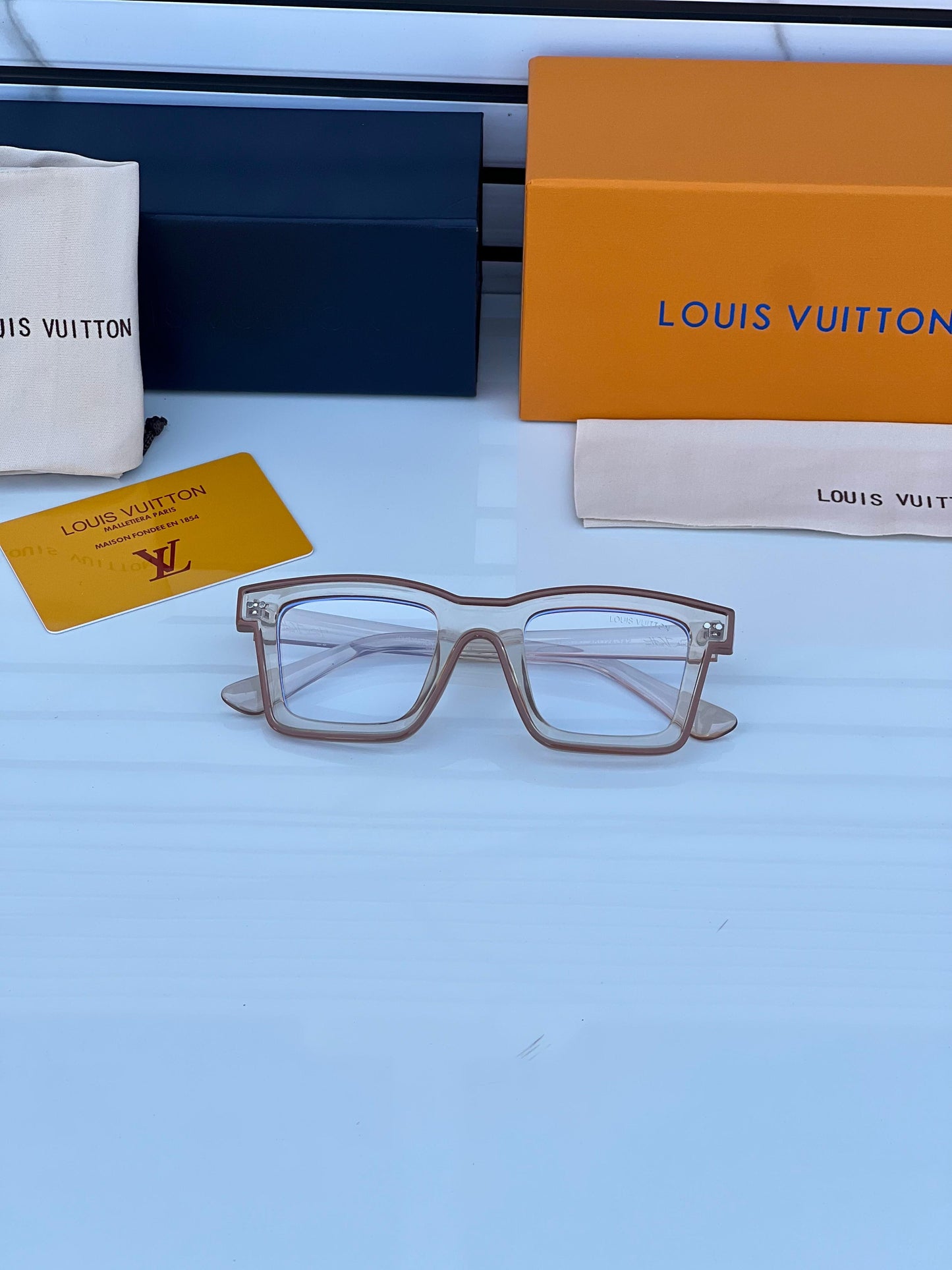 LOUIS VUITTON FRAME BROWN PLANO