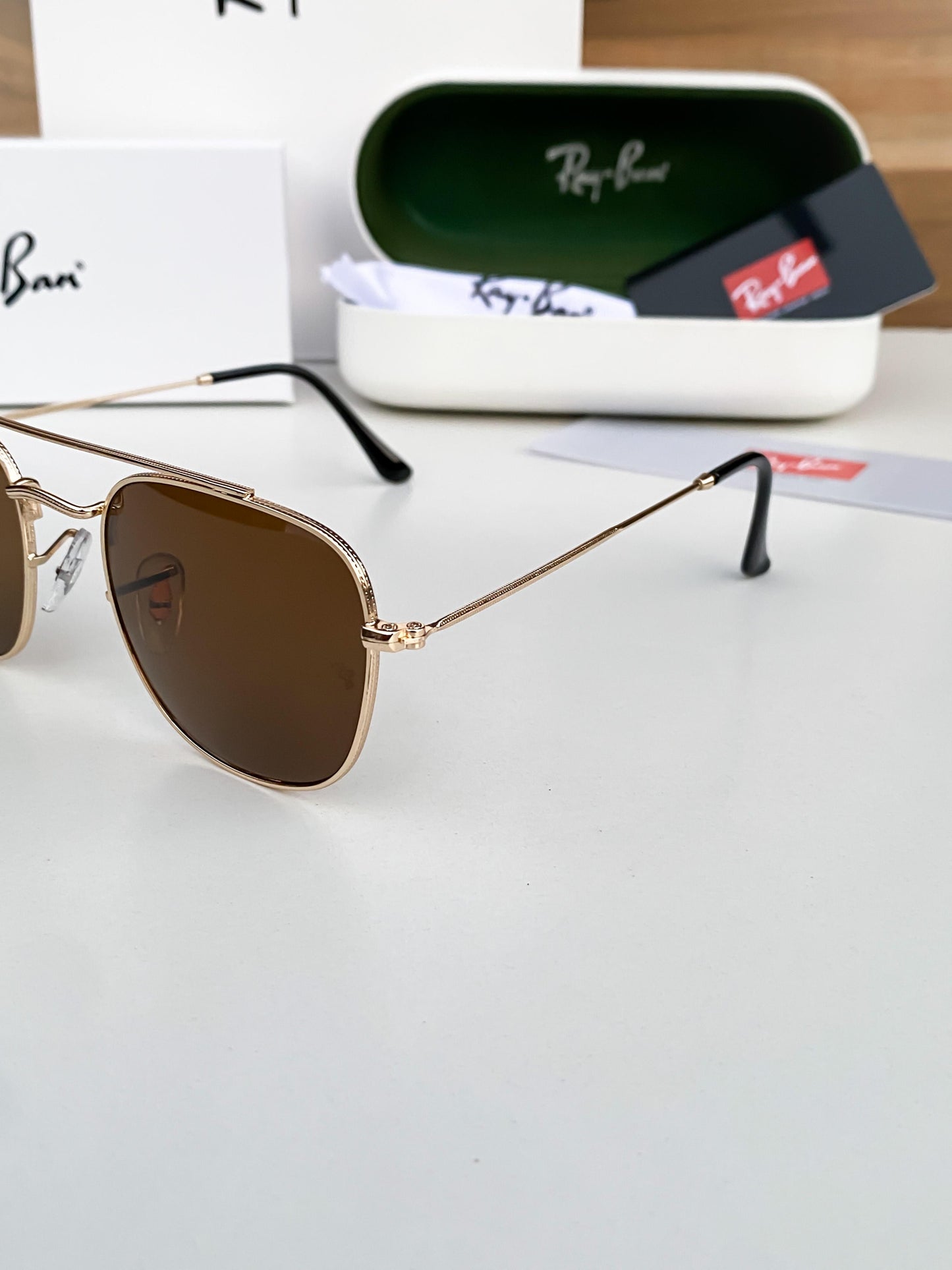 RAYBAN 3557 gola brown